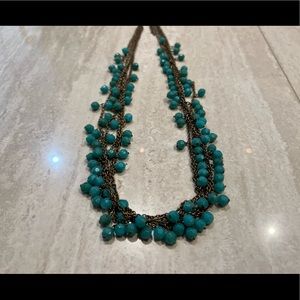 Bronze and turquoise beaded statement necklace.